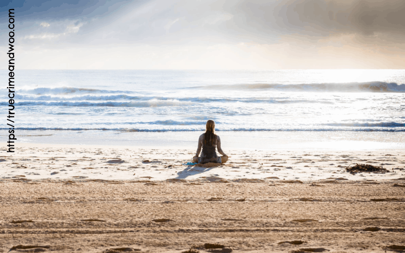 woman on beach with waves